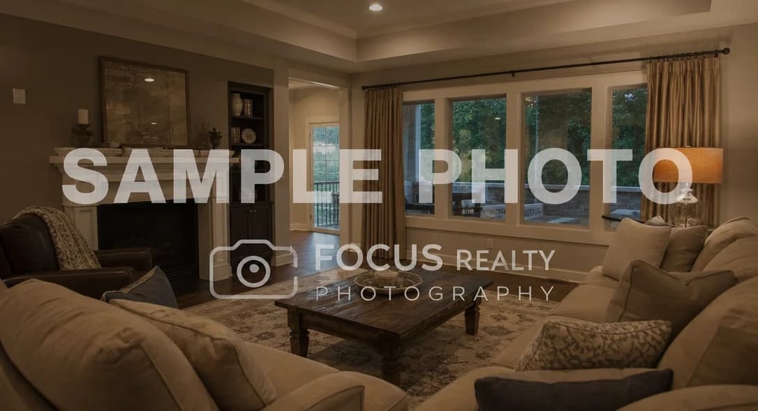 Property photo with a photographer watermark or logo overlaid on the image